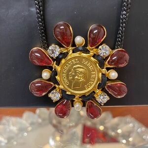 CHANEL Gold and Red Brooch with Pearl Accents